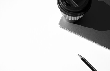 Coffee in Paper Cup on Laptop on White Background with Copy Space. Freelancer Workplace.                             