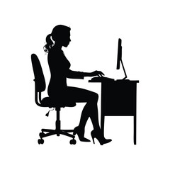 Fototapeta premium Silhouette of a woman working at a computer desk female