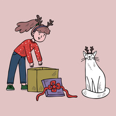 Girl in Christmas clothes opens a present, with a white cat sitting next to her.