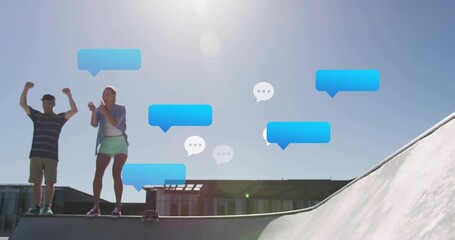 technology skateboarders cheering as chat bubbles motivating launching aerial trick above bowl - Powered by Adobe