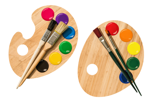 Colorful paint palettes with brushes, ready for creative inspiration
