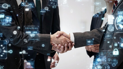 Group of business people shaking hands and digital technology