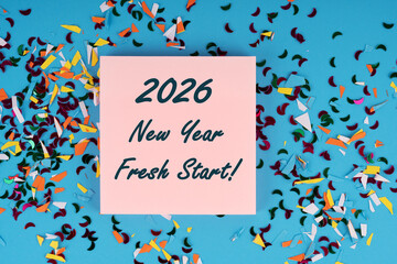 Confetti and sticky note with text 2026 New Year Fresh Start New Year concept