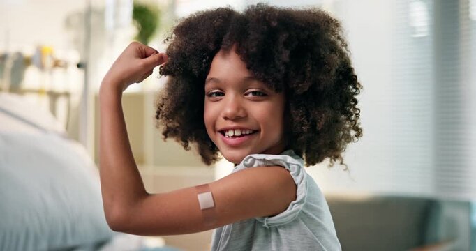 Face, child or vaccine in hospital with bandage, healthcare or flushot in consultation for medicine. Brave, African kid or immunization in clinic with smile, polio injection or plaster for protection