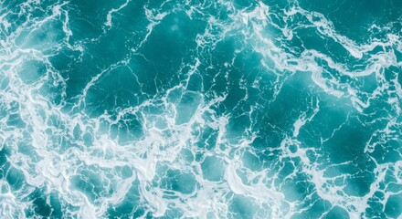Obraz premium Ocean Waves Texture Teal Water with White Foam.