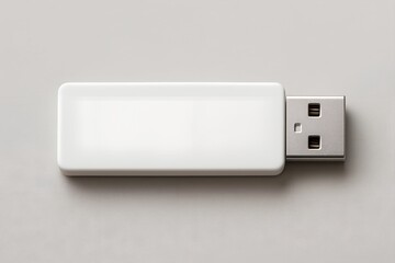 Close up of a white blank usb flash drive on a light gray background