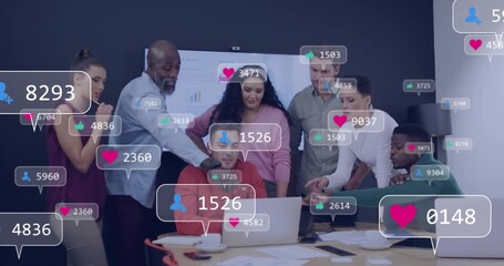 Marketing team viewing metrics animating around laptop, man clicking touchpad while counts climbing - Powered by Adobe
