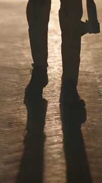 Creepy bloody axe man in white bloodstained pajamas walking through narrow haunted corridor fog cold light flickering lamp slow motion horror halloween thriller atmosphere cinematic