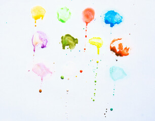 splashes of color drips on white background