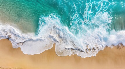 Dynamic Beachscape: Turquoise Waters, White Foam, and Footprints