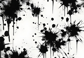 Abstract black ink splatters on a white