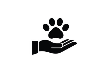 Hand holding a paw print symbolizing animal care