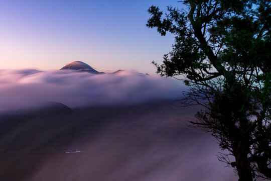 Mount Bromo in fog at night, Bromo Tengger Semeru National Park, East Java, Indonesia