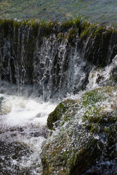 Flowing water of the River Ure at Aysgarth Falls In the Yorkshire Dales National Park, United Kingdom