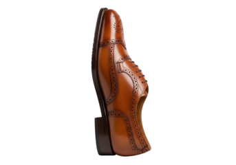 Elevated side view of a brown leather dress shoe isolated on transparent background the shoe is a classic design for formal occasions and business settings