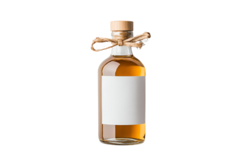 A clear glass bottle filled with golden liquid, adorned with a tied ribbon, isolated on a white background.