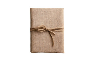 A rustic fabric-covered notebook tied with twine, perfect for journaling or note-taking.