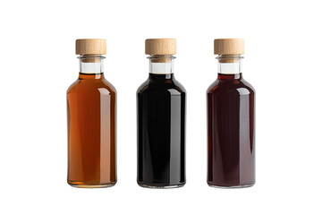 Three bottles of assorted sauces on a white isolated background.