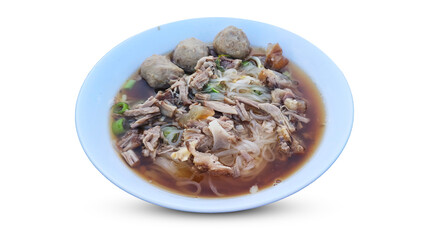 Traditional Thai beef noodle soup with soft braised beef, rice noodles, meatballs, and aromatic broth served in a blue bowl 