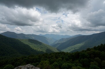 Naklejka premium clouds over the mountain