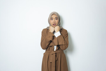 young Indonesian jilbab girl stress on isolated white