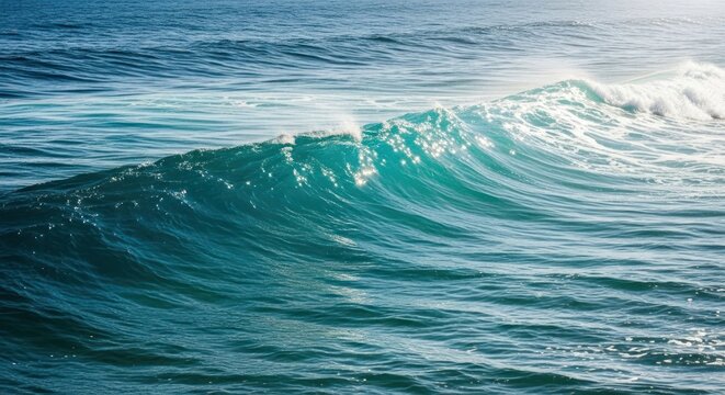 Powerful ocean waves crash, vibrant turquoise