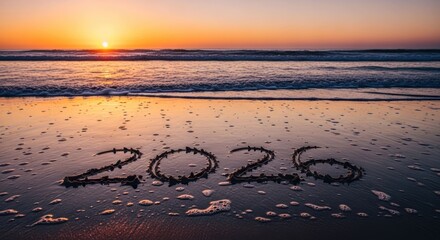 Sunset beach scene, 2020 written in sand