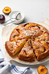 Homemade The New York Times plum and almond cake. Summer or autumn fruit pie. Home cooking. Selective focus.