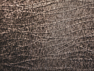 Fototapeta premium Textured Surface: A detailed shot of a unique, abstract surface, perfect for texture enthusiasts and designers, evoking depth and visual interest.