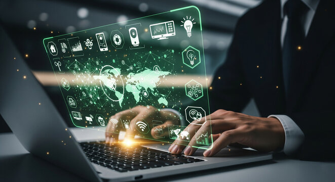 Businessman using laptop with futuristic holographic interface displaying global network and digital icons, representing technology and connectivity