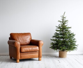 A simple, modern living room setting, featuring a light brown leather armchair and a small Christmas tree, creating a cozy and neutral ambiance.