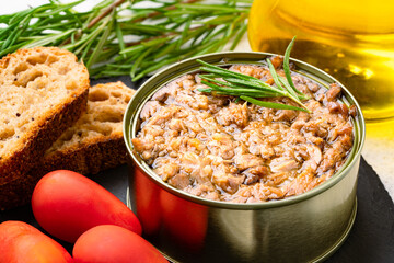 Canned tuna in brine isolated on vintage background	