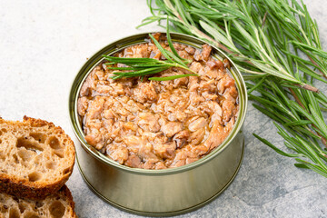 Canned tuna in brine isolated on vintage background	