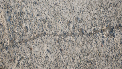 Cracked concrete road texture background.Road infrastructure and transportation concept. For graphic design and banners