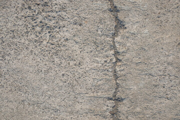 Cracked concrete road texture background.Road infrastructure and transportation concept. For graphic design and banners