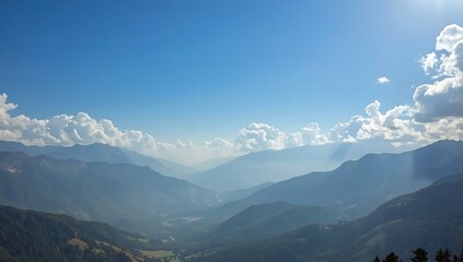 Panoramic Mountain Valley Landscape: Blue Sky, Clouds, and Distant Peaks