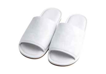 Pair of white hotel slippers isolated on transparent background