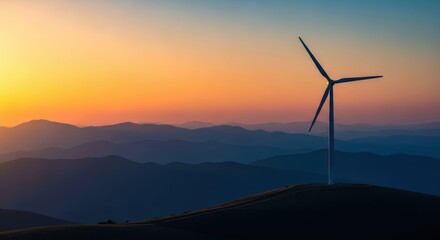Wind Turbine Silhouetted Against a Vibrant Mountain Sunset Sky