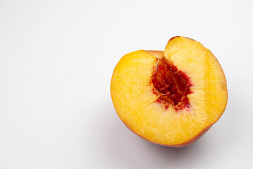 Close-up of a sliced ripe fruit on a clean background.