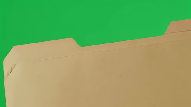 Blank manila file folder with tabs against vibrant green chroma key background, isolated for compositing