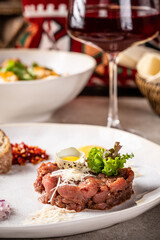 Beef tartare with quail egg and parmesan.