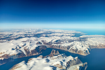 Aerial view of snowy fjords on Baffin Island, Nunavut, Canada © Thomas