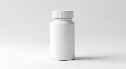 A blank, white plastic pill bottle sits centered against a plain, light gray backdrop.