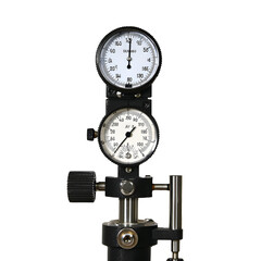 Close-up of a sophisticated industrial measuring instrument featuring dual stacked precision gauges, meticulously designed for accurate data acquisition in scientific and engineering environments