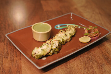 Cheese Paneer Tikka with Mint Chutney and Fresh Garnish