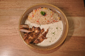Grilled Chicken with Vegetable Rice and Creamy Sauce