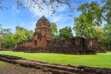 Ancient architecture at Mueang Sing castle in Kanchanaburi Thailand surrounded by forest and green grass