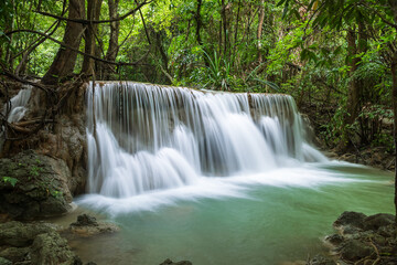 Serene waterfall in tropical jungle at Huay Mae Khamin National Park, Kanchanaburi, Thailand