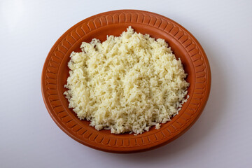 Plain white rice, a traditional staple food, served in a rustic clay bowl. This common Bangladeshi dish symbolizes comfort, simplicity, and cultural authenticity.