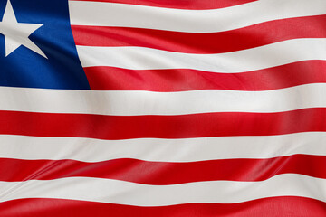Waving flag of Liberia, with textured fabric gently rippling, symbolizing unity, freedom, and...